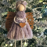 This is an memorial angel for an animal with the engraved words You left paw prints on our hearts: In loving memory of (pets name + date).