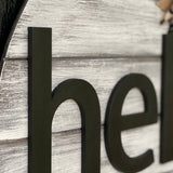 This image sows a close up of the wood cutout lettering.