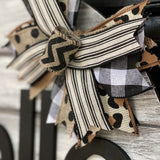 This image shows a close up of the burlap bow.