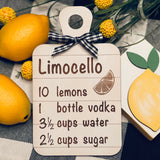 This mini shiplap cutting board sign has an engraved Limocello recipe with a buffalo check ribbon attached. For decorative use only. Item not sold with other products shown in picture.