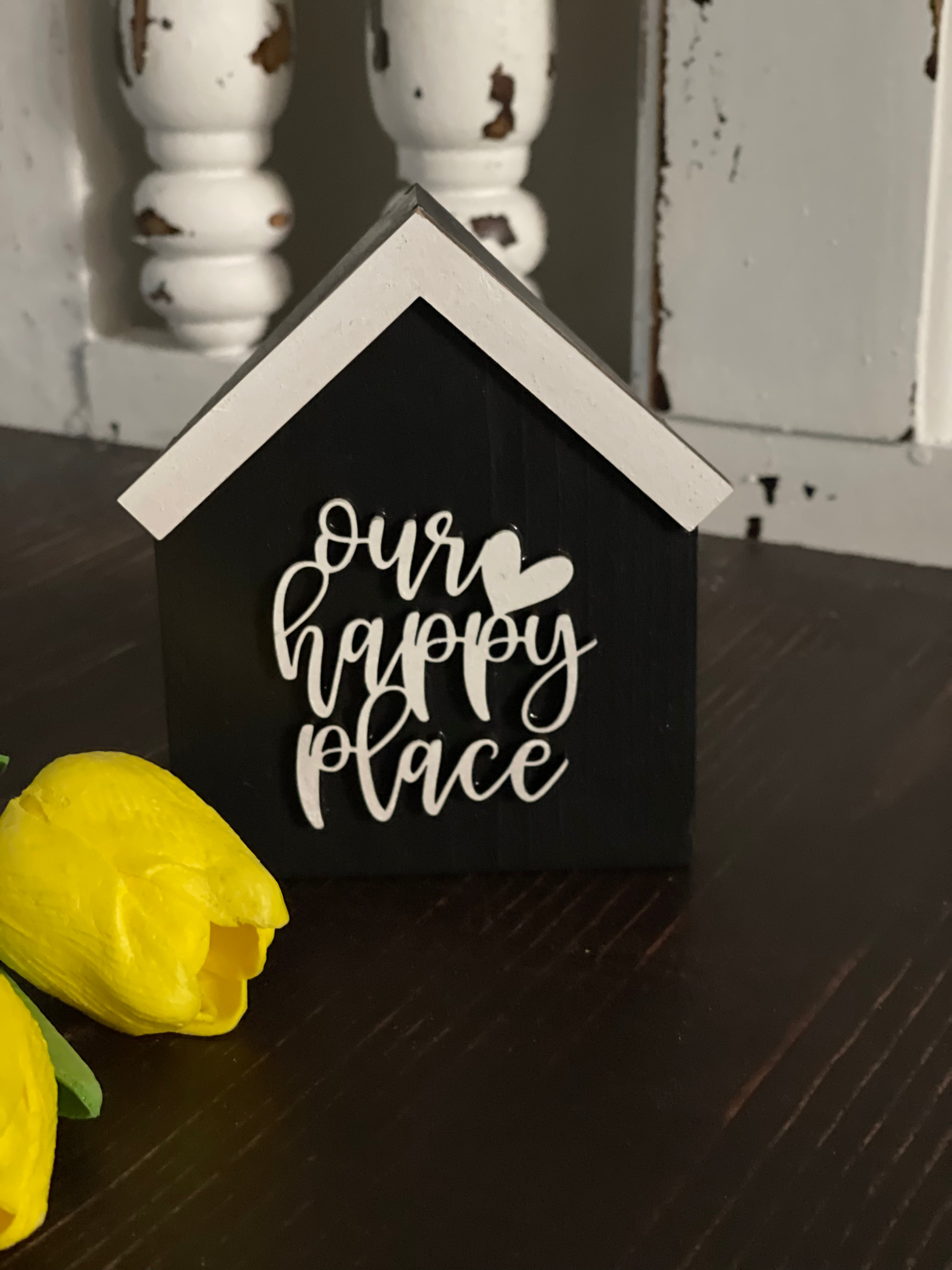 This image shows the black Our Happy Place.