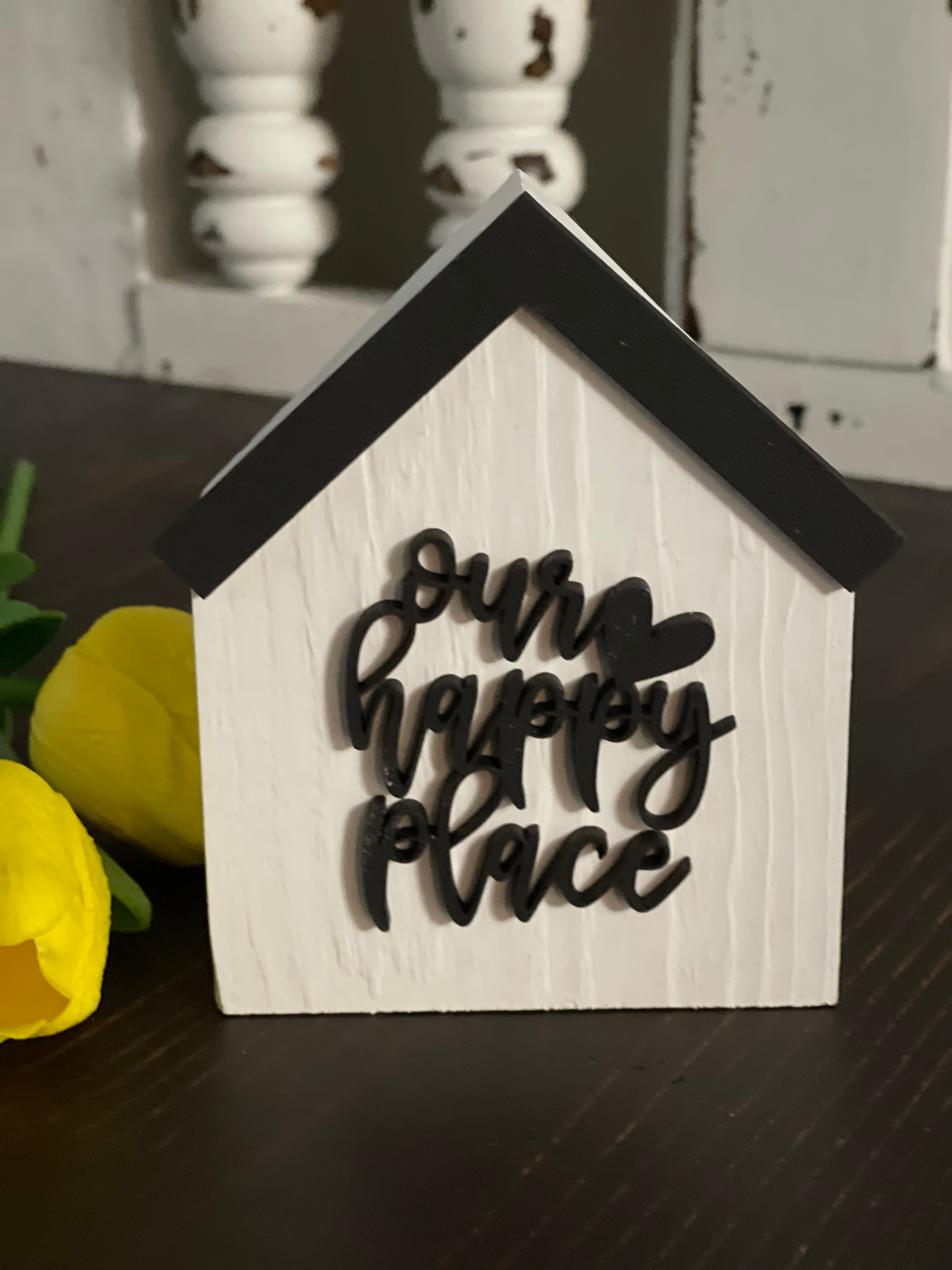 This image shows the white Our Happy Place.