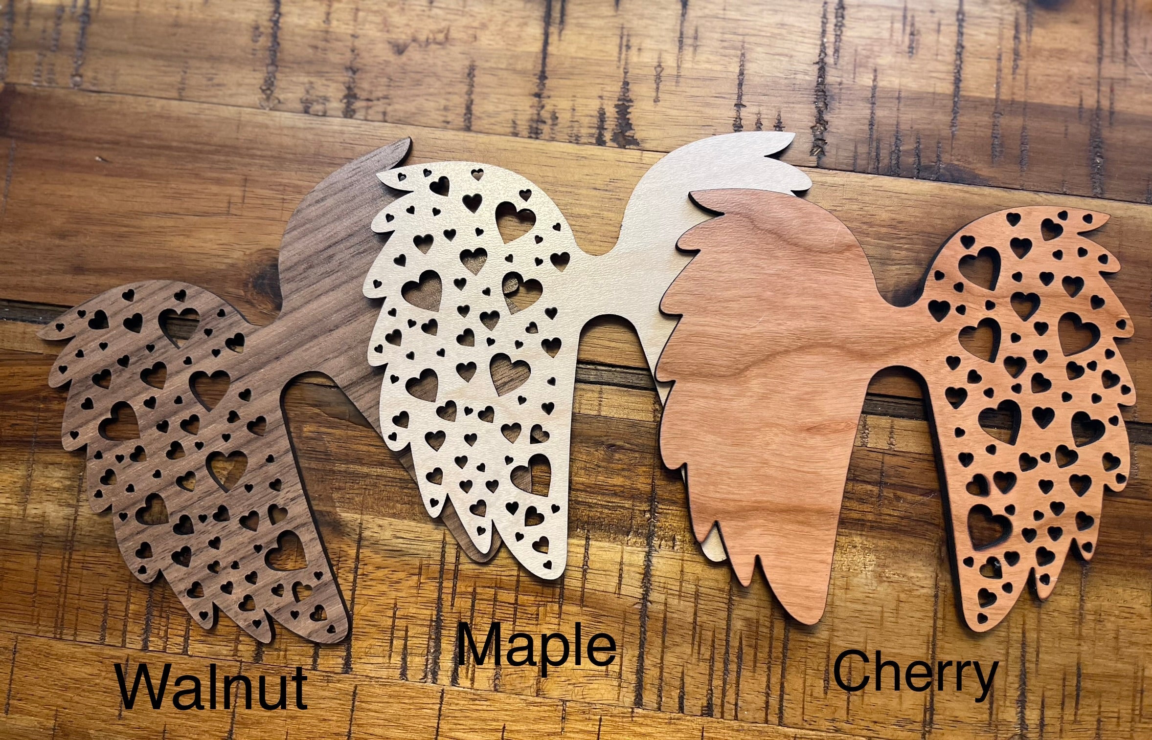 This image shows all three wood colors.  From left to right: Walnut, Maple, and Cherry.