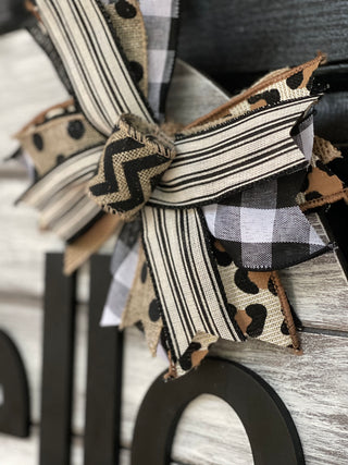 This image shows a close up of the burlap bow.