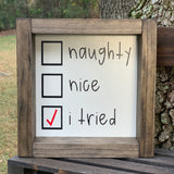 This image shows the Naughty, Nice, I Tried sign by itself.  There is a red check mark in the box for I tried.