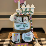 This image shows the set displayed in a mini tiered tray.  