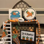This carrot patch 3D decor comes as a set.  Cathedral tiered tray not included.  Set comes with 1 5x5 blue vintage 3D truck, 1 5" round shiplap 3D carrot sign, 1 35" orange and white beaded garland with twine tassels, 1 5 cent a bunch (4x6") 3D frame sign, 1 3D buffalo plaid carrot ( 5.5x2") and a 9" wood ladder.  