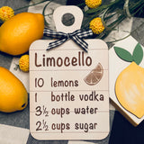 This mini shiplap cutting board sign has an engraved Limocello recipe with a buffalo check ribbon attached.  For decorative use only. Item not sold with other products shown in picture.