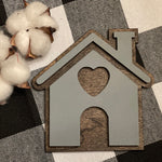 This image shows the mini house cutout sing displayed with mini cotton stems, not sold with product.