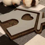 This is an alternative image showing the 3D sign from a side view.