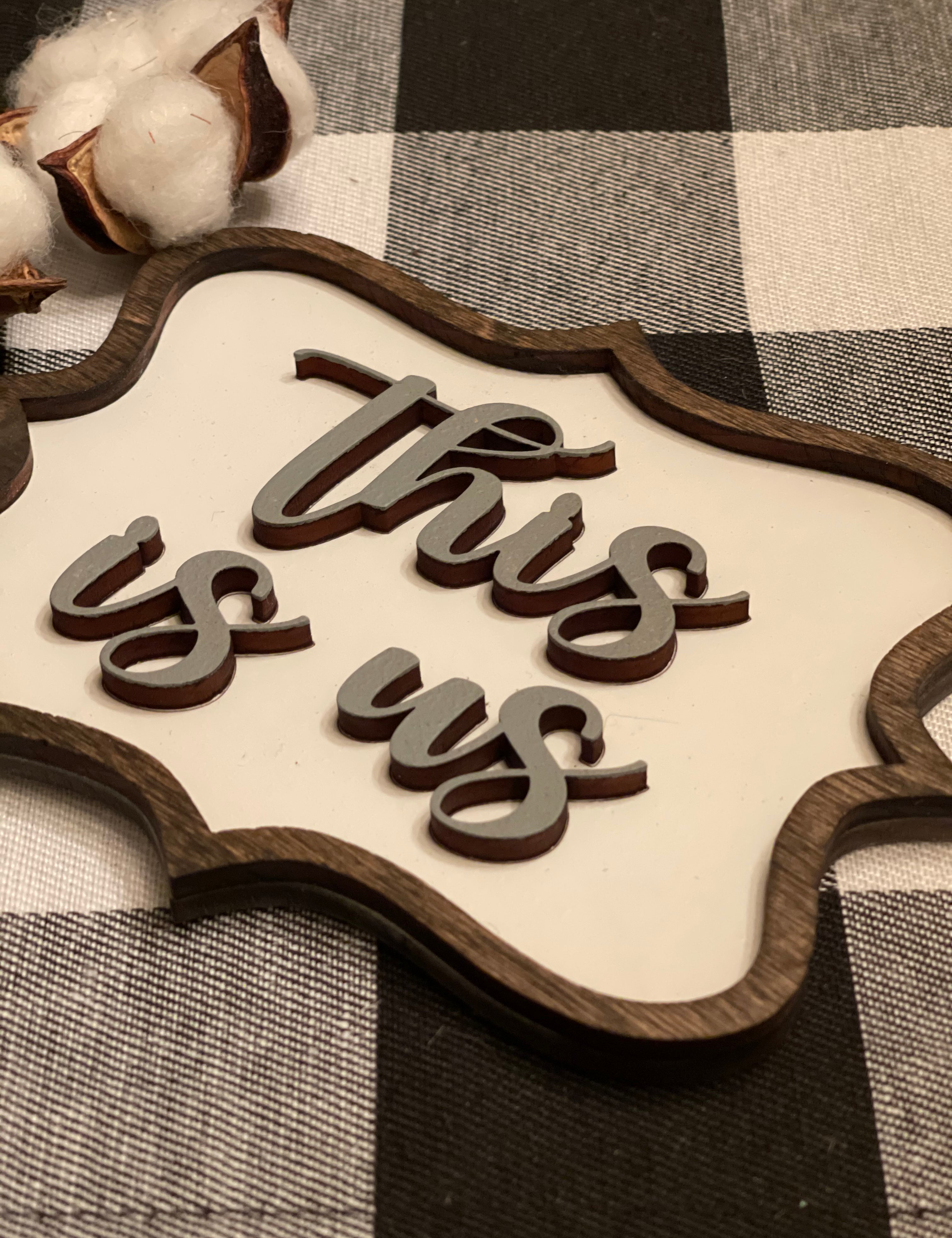 This image showcases the raised wood on the mini sign.