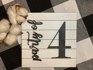 This mini sign is shown paired with our mini cotton stems, not sold with the sign.  The shiplap backing is white with black script party of and the number 4.  You select which number you want by adding that in the note section once item has been added to your cart. 