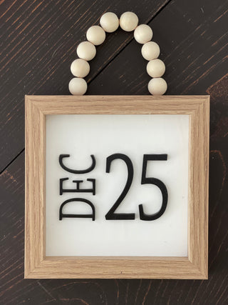 This  image shows the DEC 25 displayed on a bench.