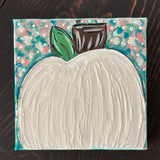 This image shows the teal pumpkin.