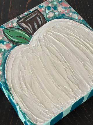 This image shows the textured hand painted teal pumpkin.