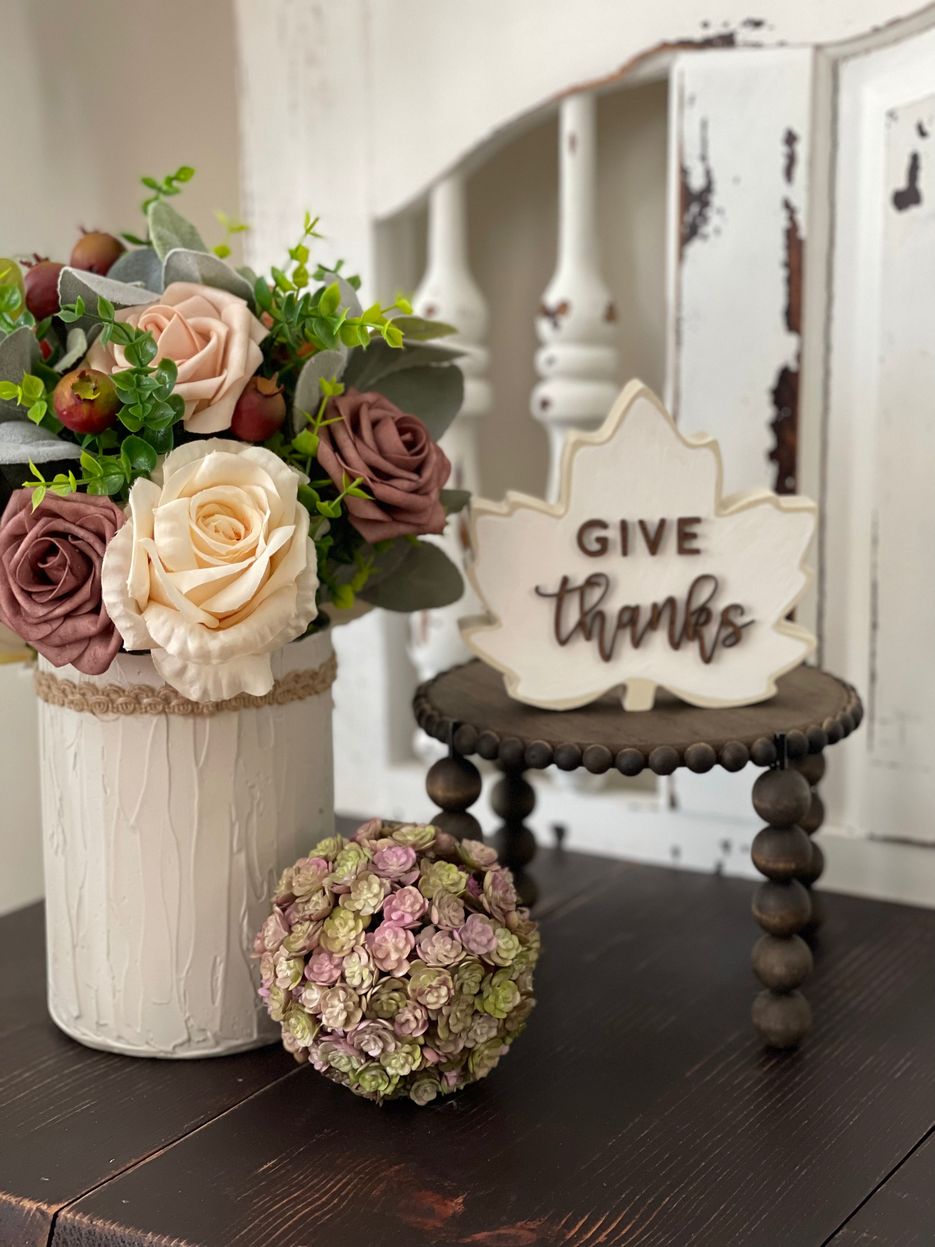 This image shows the Jacobean stand paired with various decor items. Each item sold separately.