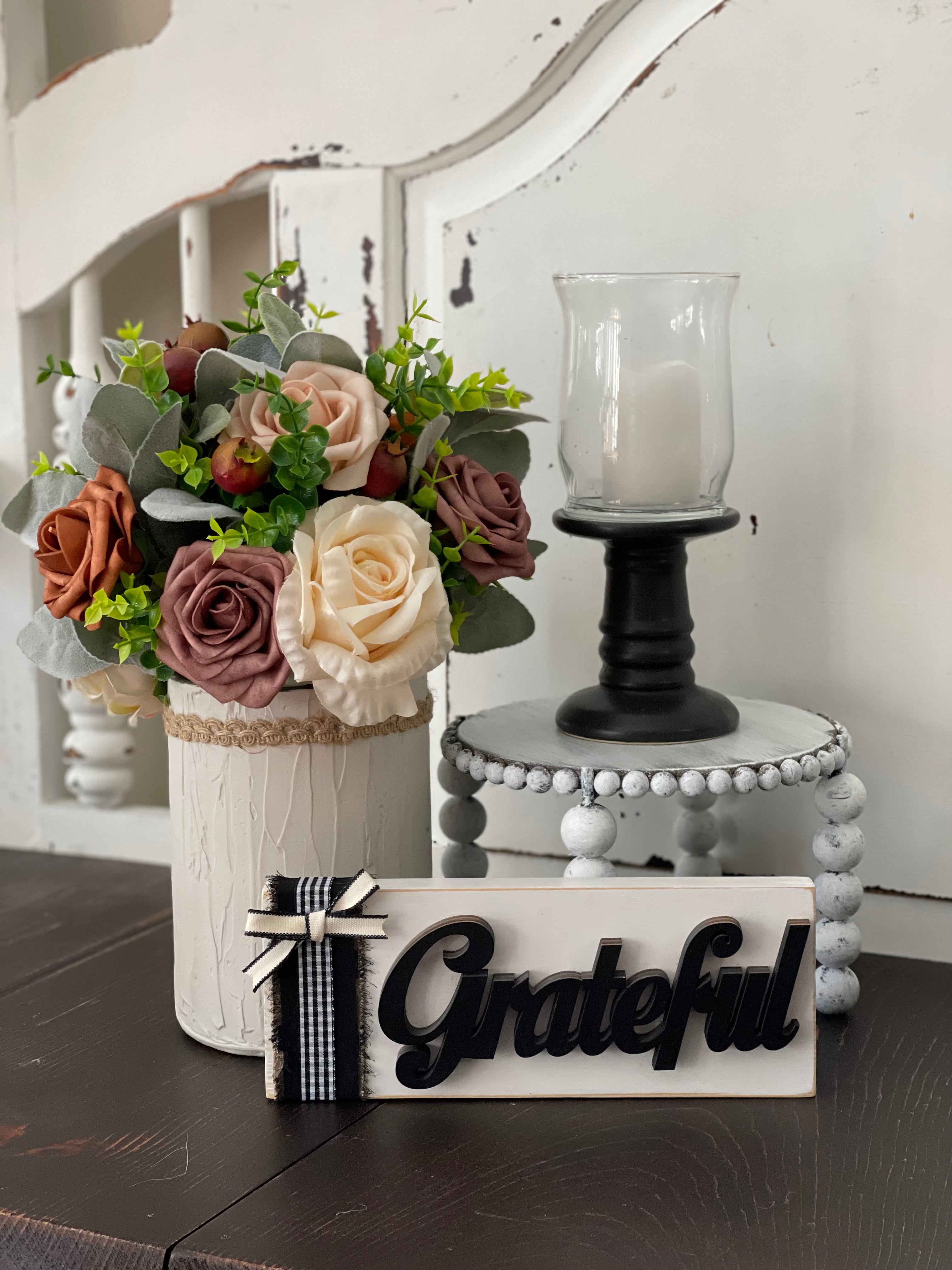 This image shows the white distressed stand paired with a floral arrangement, candle, and a grateful 3D sign.  Each item is sold separately.