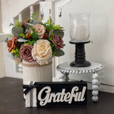 This image shows the white distressed stand with other paired decor items.  Each item is sold separately.