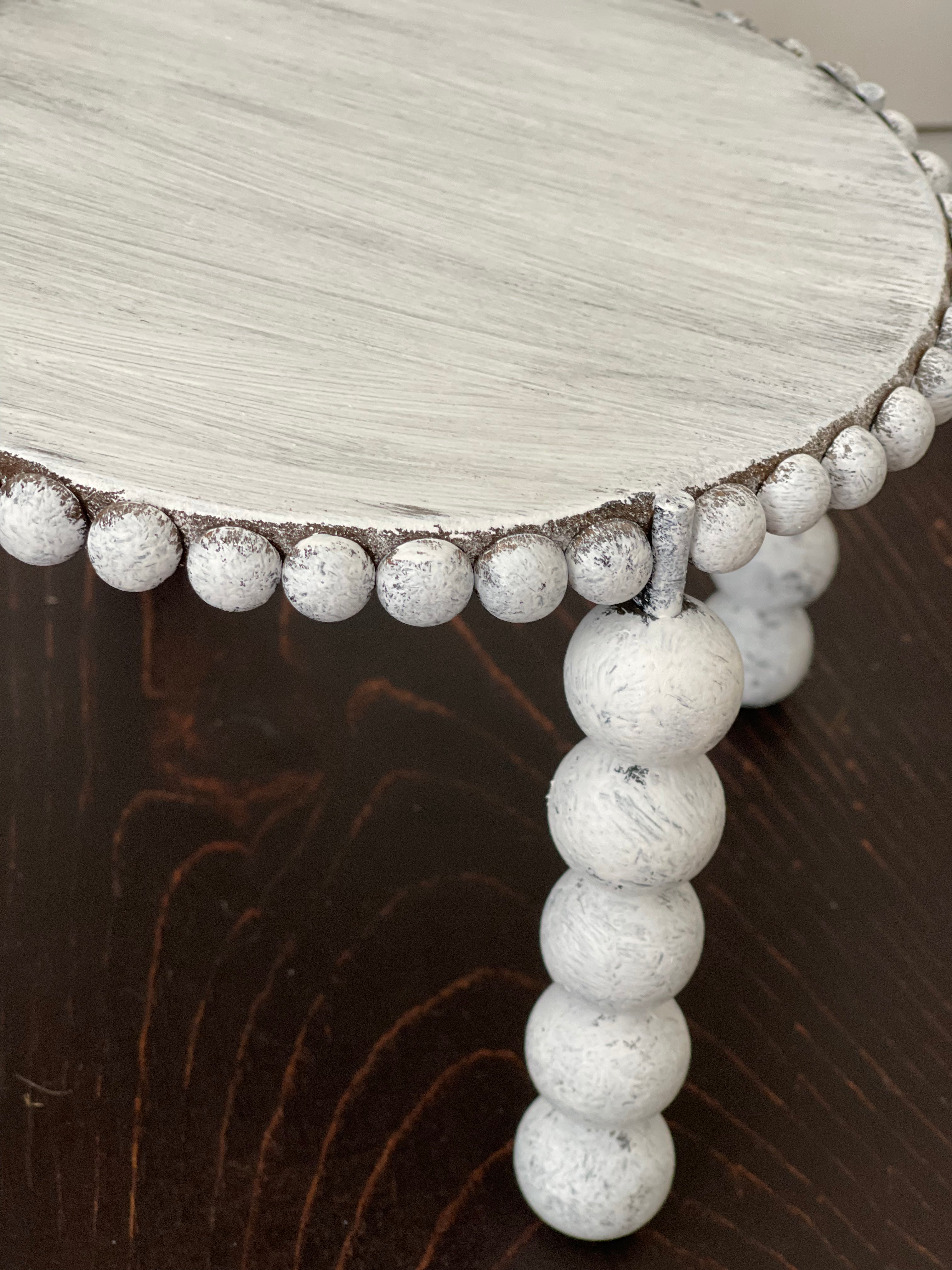 This image shows the white distressed beads.
