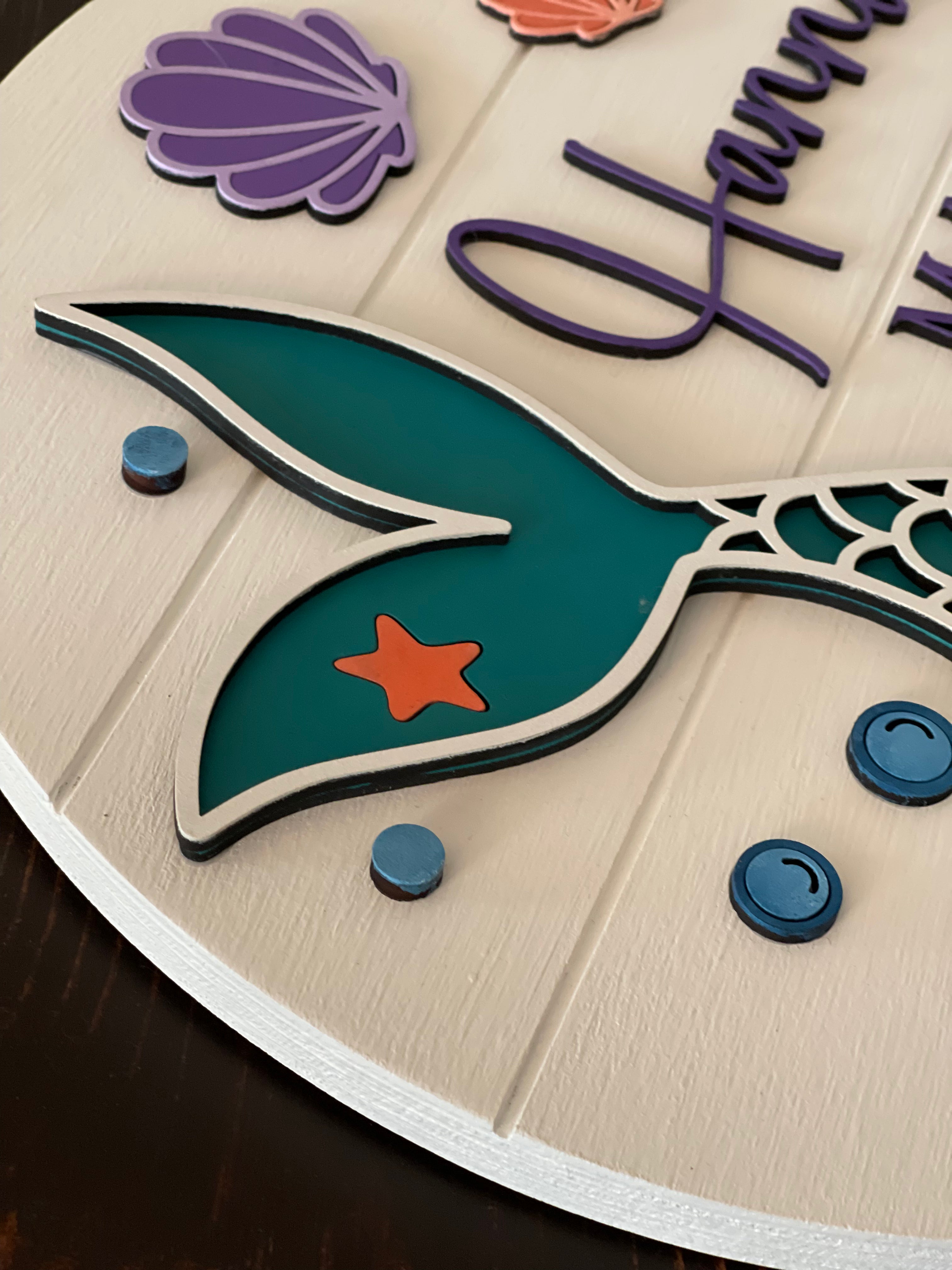 This image shows a close up of the 3D mermaid tail and bubles.