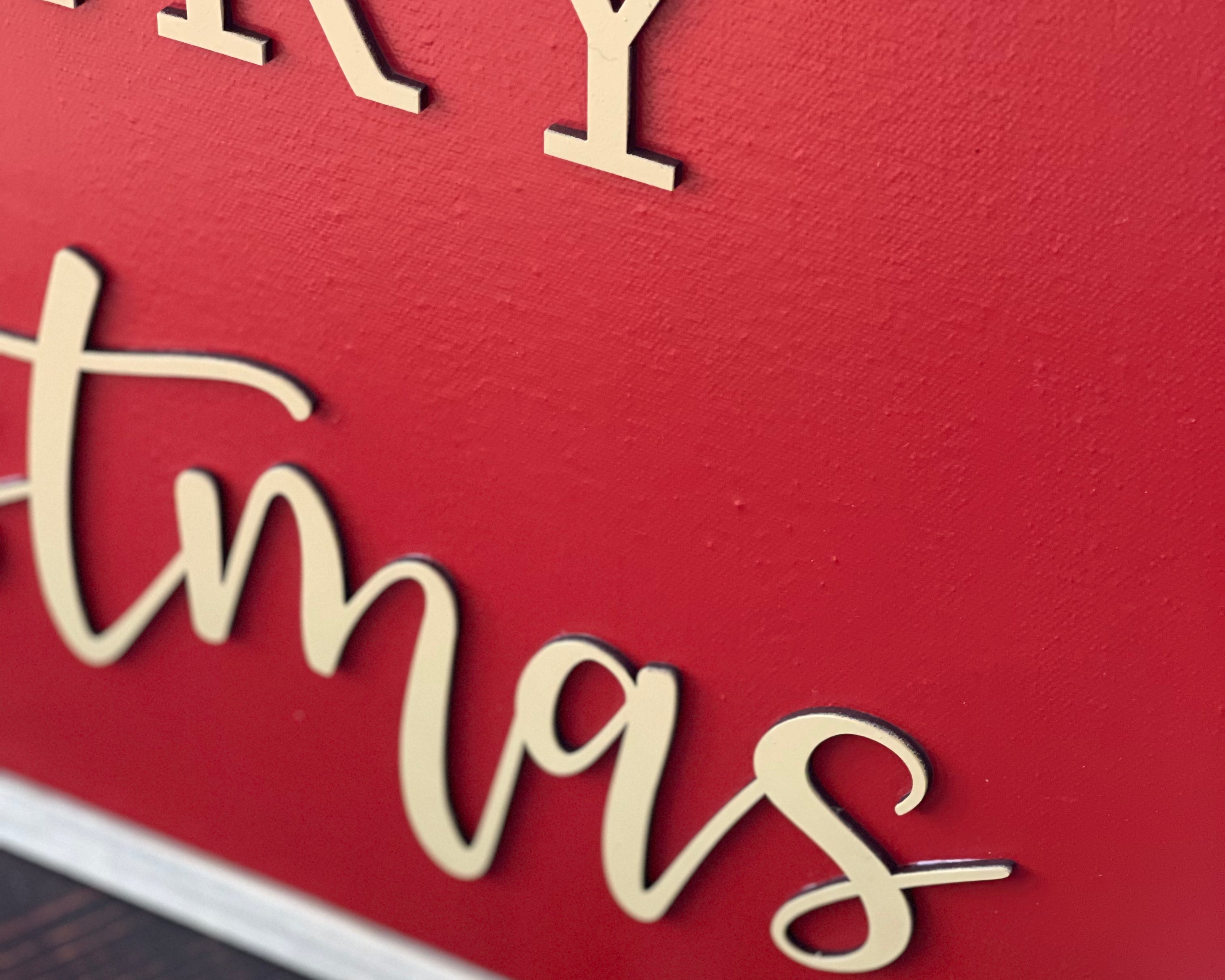 This is a close up of the red sign with 3D lettering.