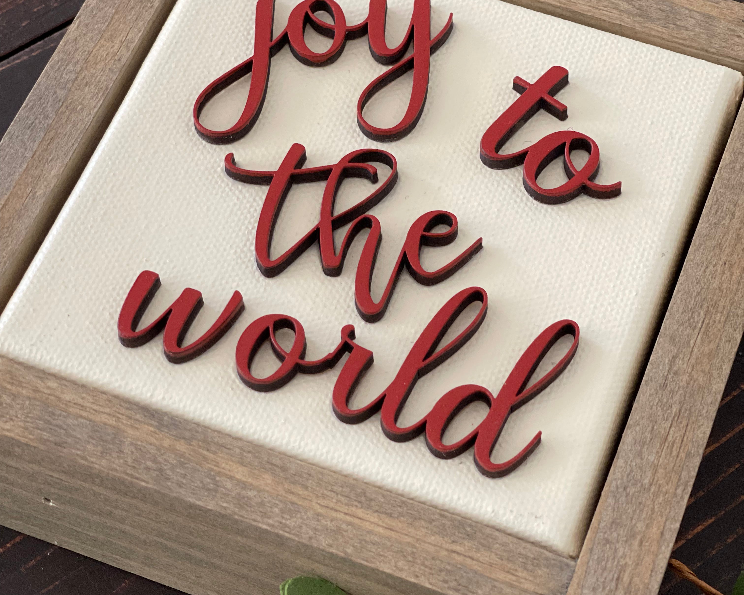 This image shows the sign and a close up of the 3D lettering.