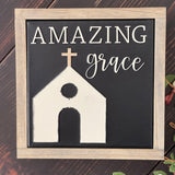This image shows the sign Amazing Grace with a church, all in 3D cutouts.  A stained frame has been added to the canvas sign.