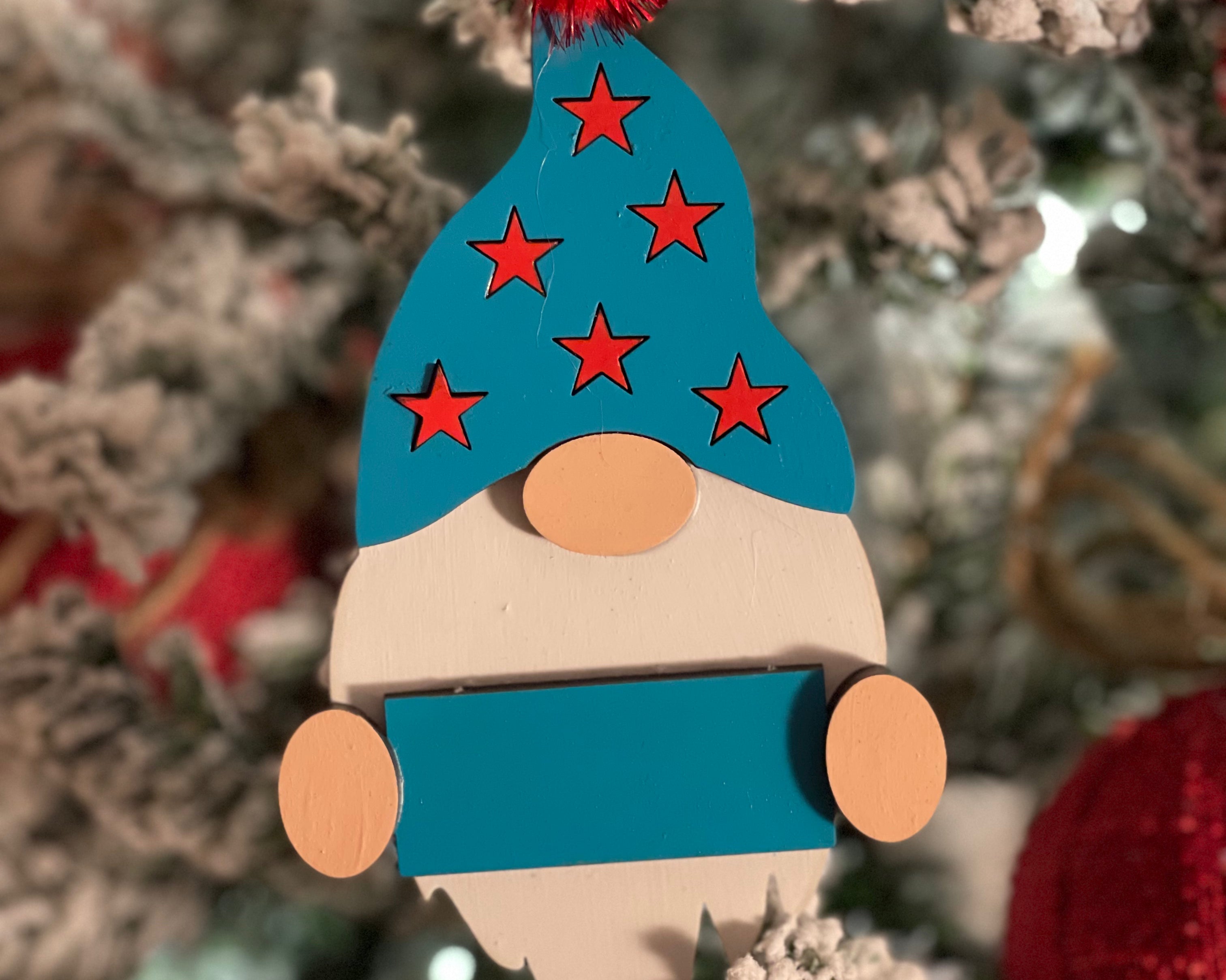 This is the turquoise gnome hanging on a tree.