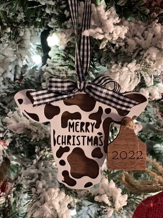 This is the walnut and white ornament with ear tag that reads 2022.