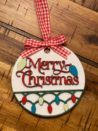 This ornament is displayed on a wood table.