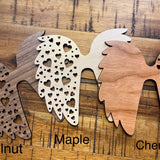 Pictured left to right:  Walnut, Maple, and Cherry wood wings.