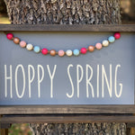 Hoppy Spring (March 2020 Design of the Month) is shown sitting outside on a ladder.