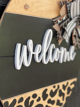 This image show a close up of the 3D welcome cutout.