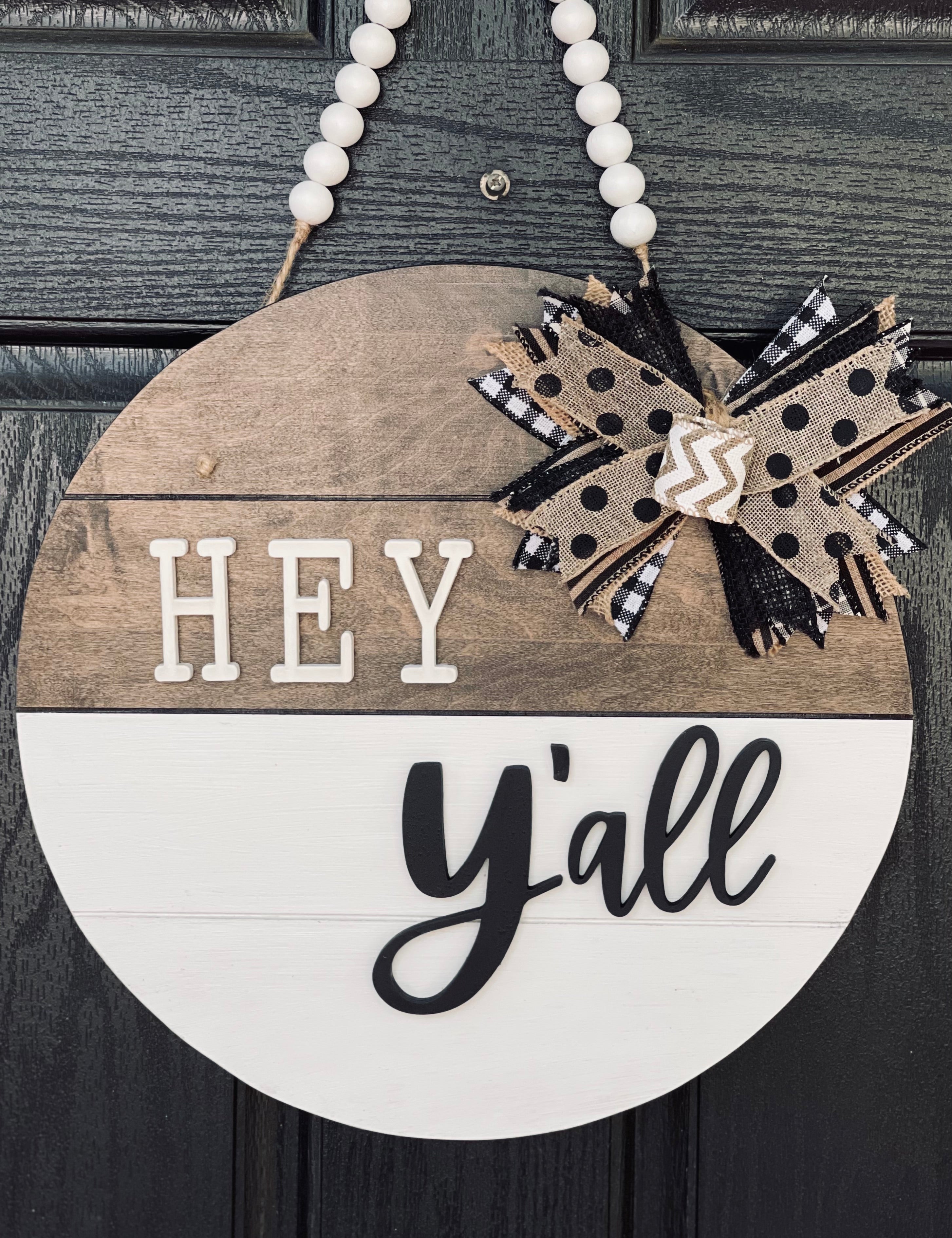 Hey Y'All Shiplap Door or Wall Hanger is shown hanging on a front door.