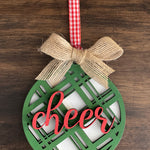 This is the green cheer plaid ornament with a twine bow.