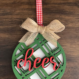 This is the green cheer plaid ornament with a twine bow.