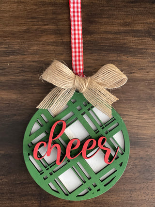 This is the green cheer plaid ornament with a twine bow.