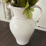 this is a close up of the pitcher. 