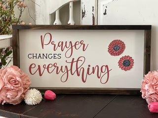 This is the white sign with textured floral design.