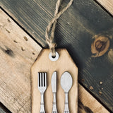 This image show the full view of the gift tag silverware set.