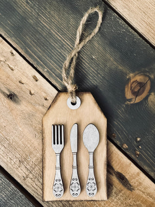 This image show the full view of the gift tag silverware set.