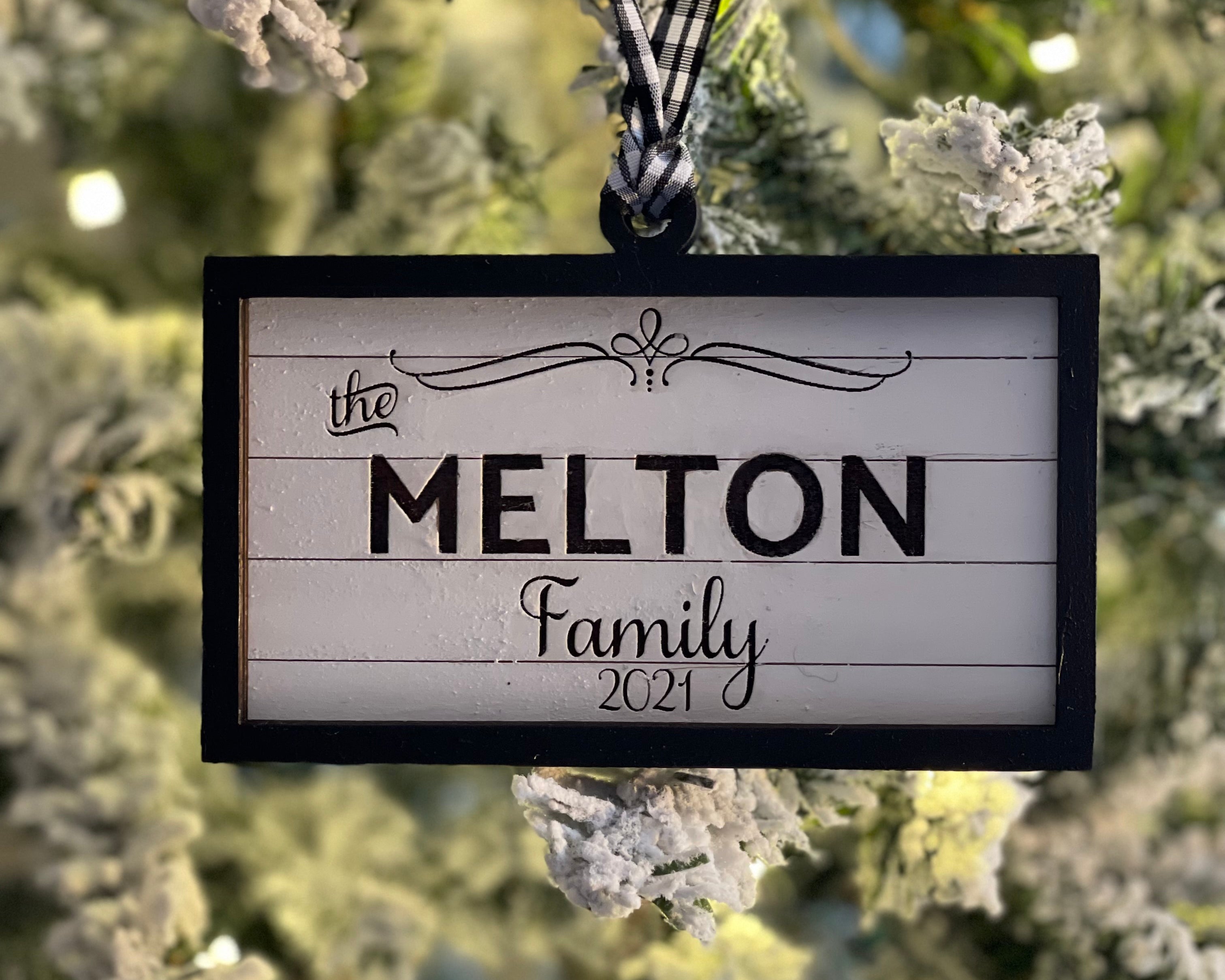 This laser engraved family last name ornament is engraved on a shiplap background with the year 2021 added.  Choose to add a year, est date or leave blank.  Perfect for any gift or as an added embellishment on any package. 