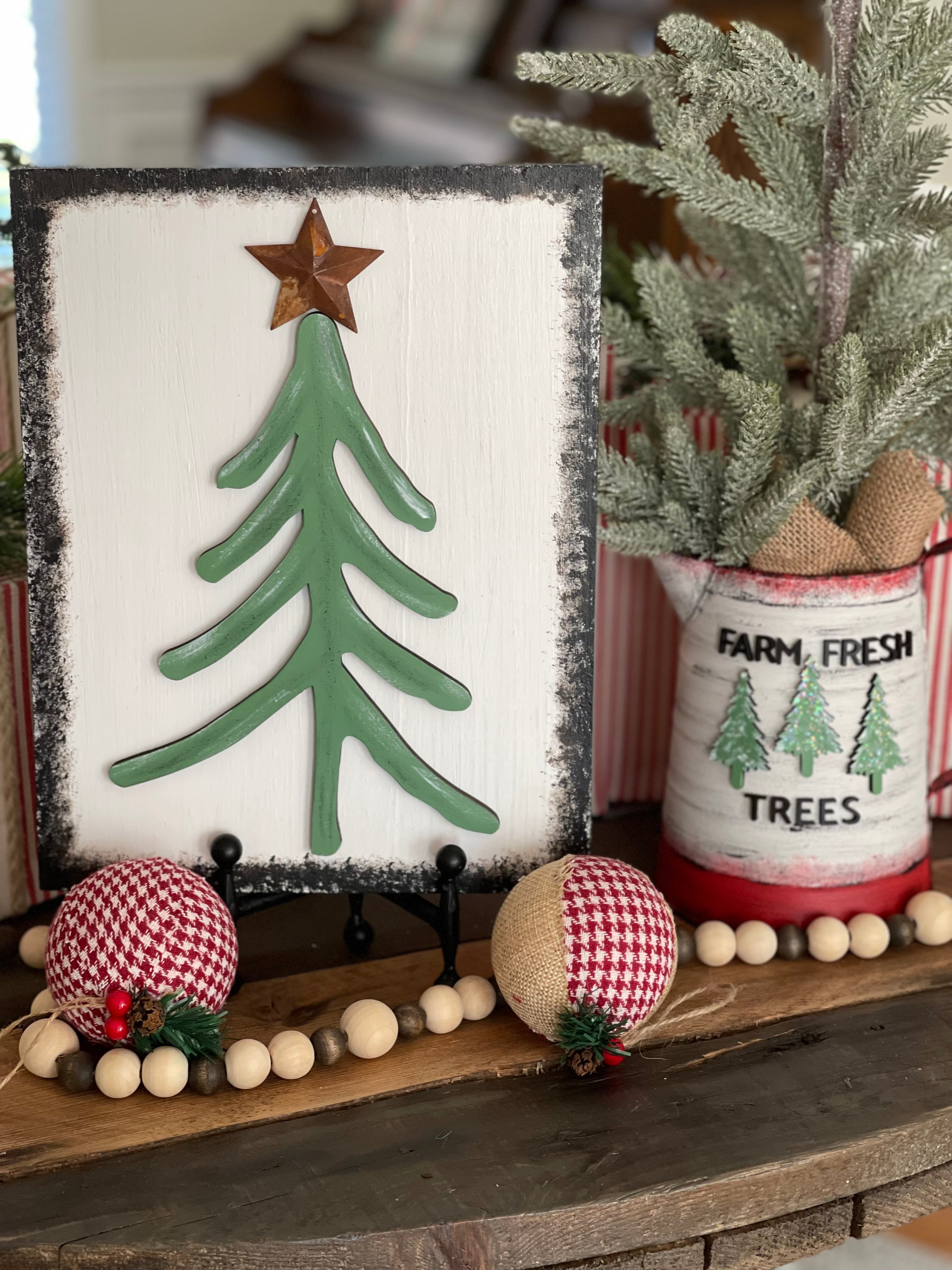 This image shows the pine tree paired with our 3D wood cutout Christmas tree with a metal star.  Each are sold separately.  