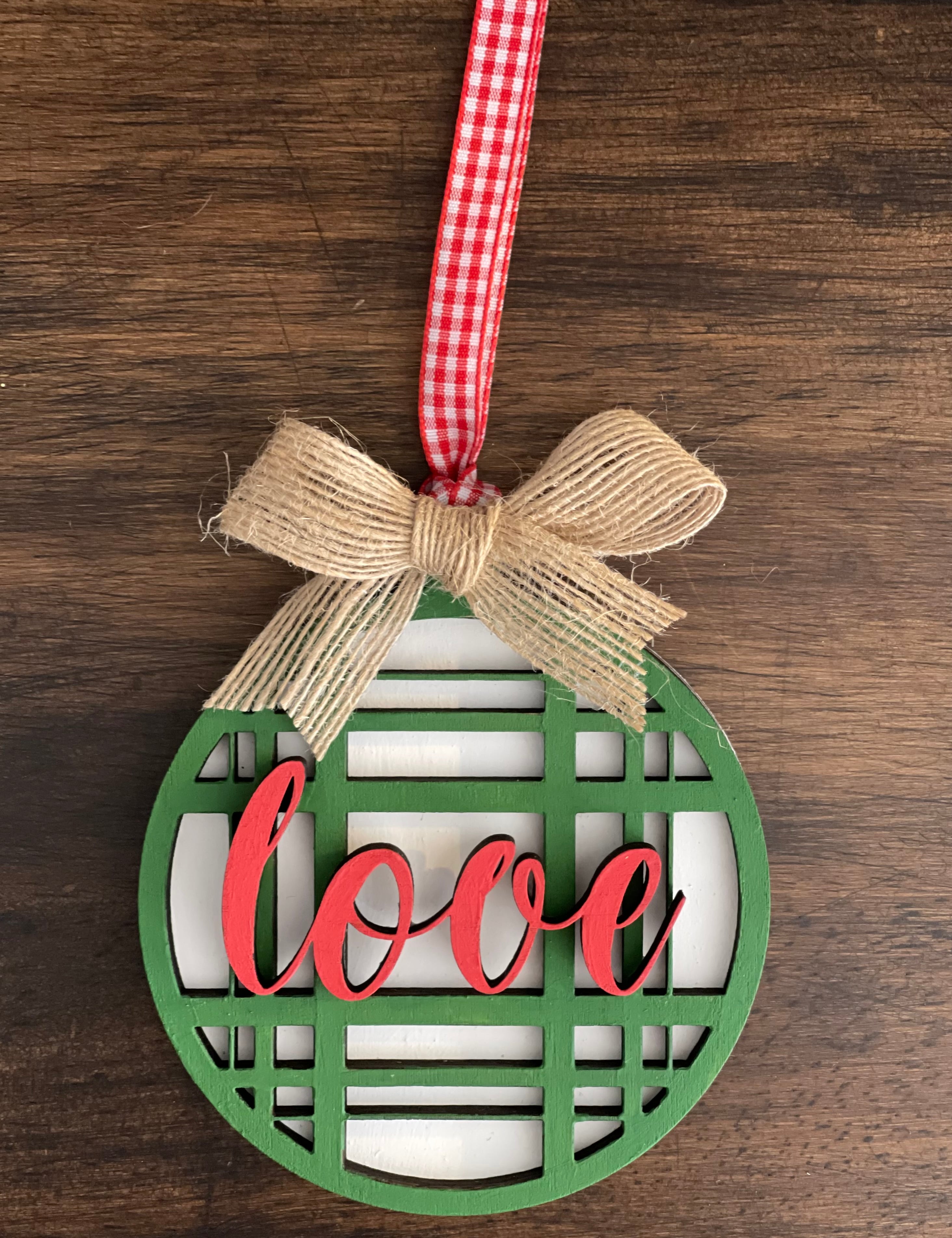 This is the green plaid love ornament with a twine bow.
