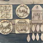 6 piece 3D Wood DIY Christmas Tiered Tray Decor Set.  Comes with (1) Shiplap Dec. 25th square sign, (2) round signs, one that says Merry and the other says Bright, (1) square santa stop here sign, a gift tag that says JOY, and Christmas light banner garland.  Twine will be provided for the gift tag and light garland.  Kits can be purchased with or without paint and accessories. 