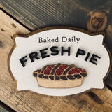 This image show the baked daily fresh pie laser engraved and 3D sign.