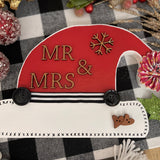 This santa hat says Mr. & Mrs.
