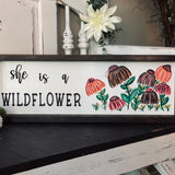 This textured wildflower sign has 3D letters and hand painted flowers.