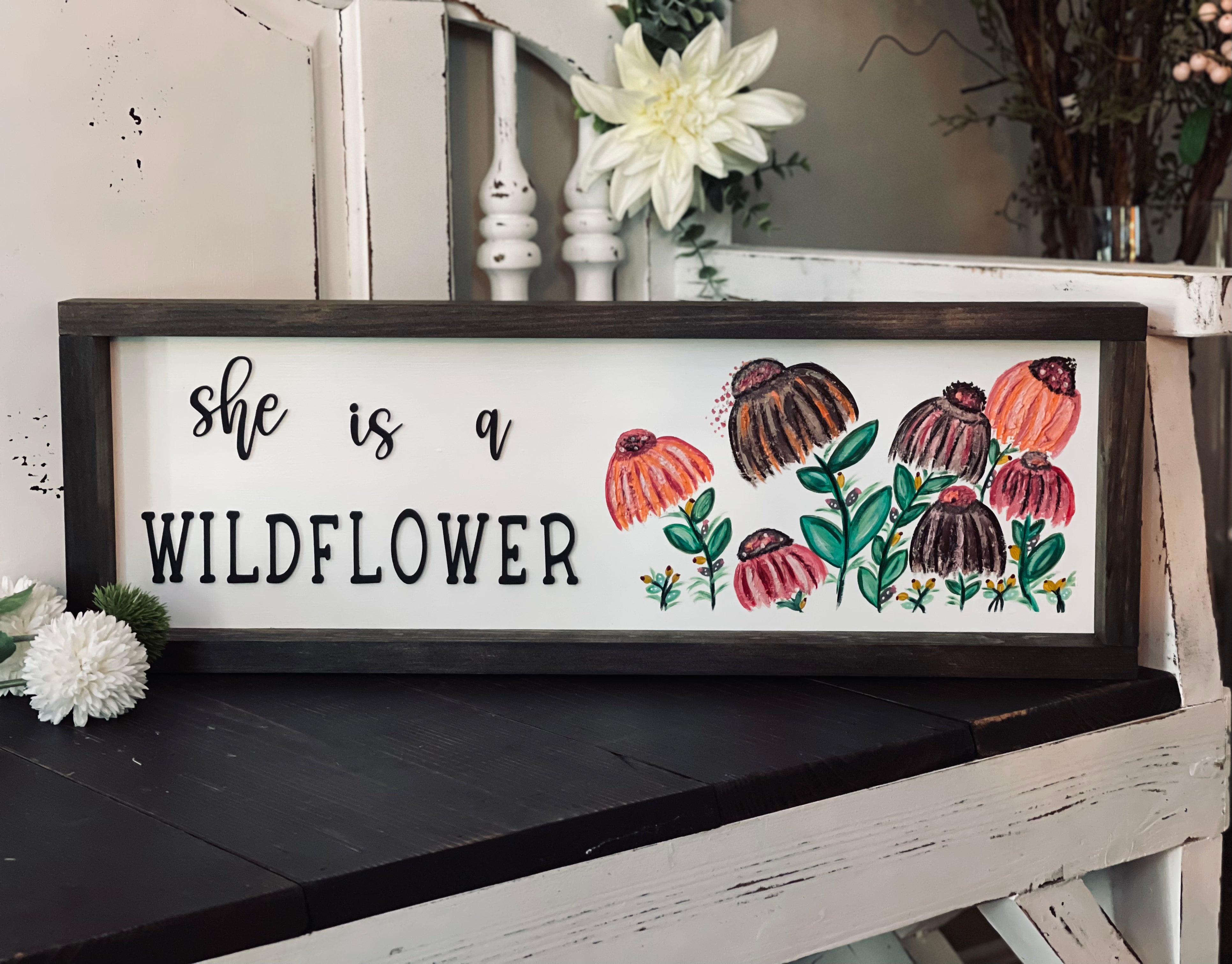 This textured wildflower sign has 3D letters and hand painted flowers.