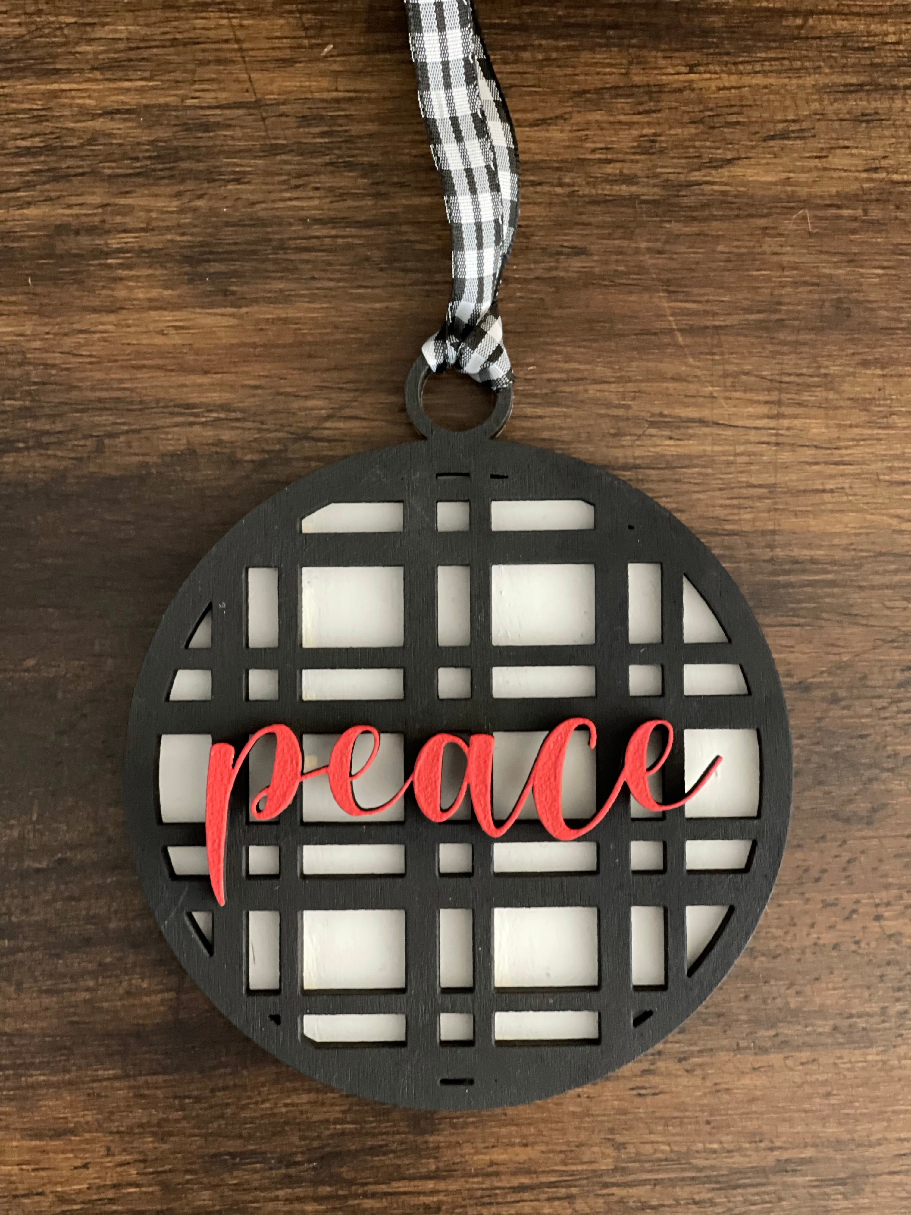 This is the black plaid peace ornament without a twine bow.